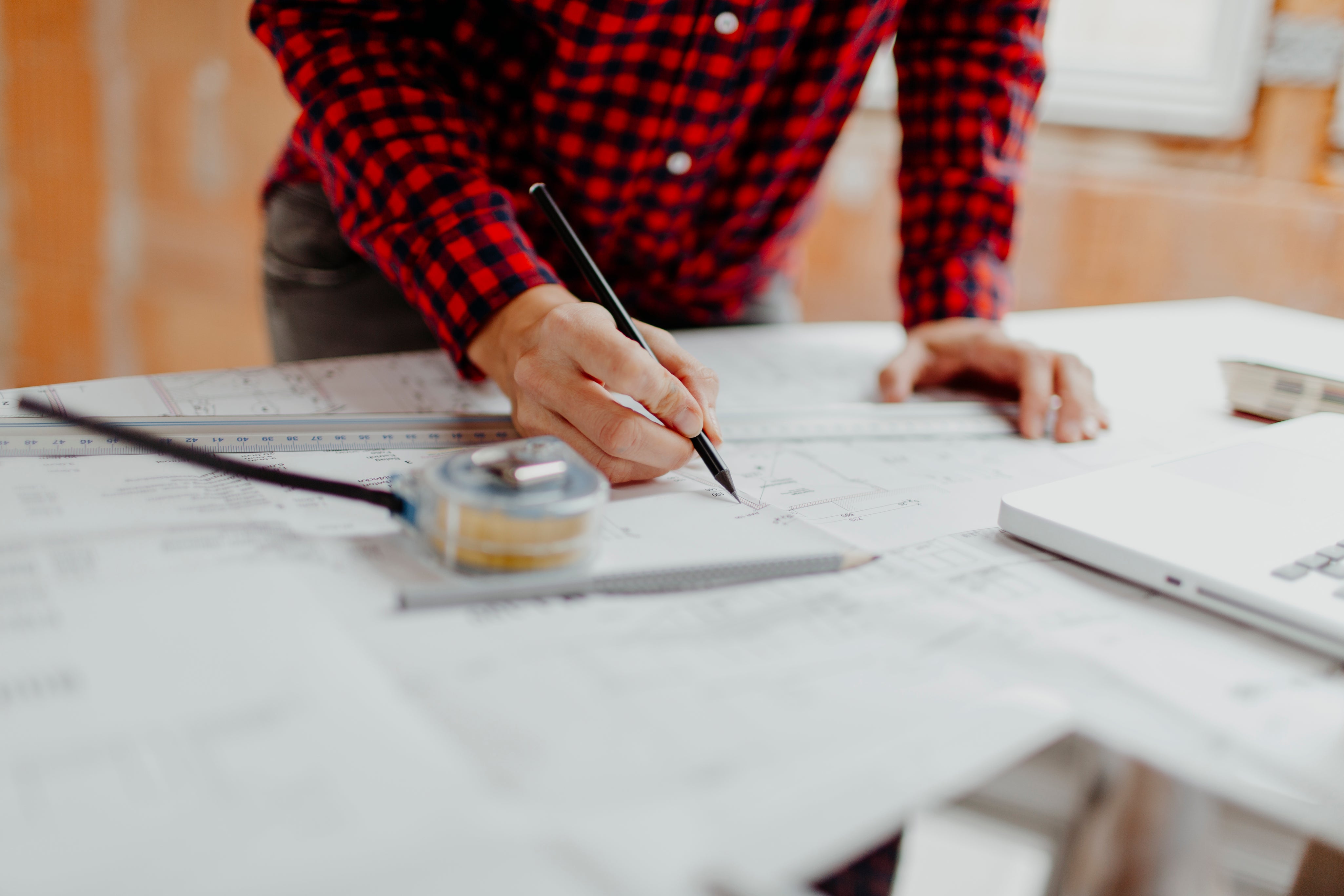 midsection-man-working-table.jpg