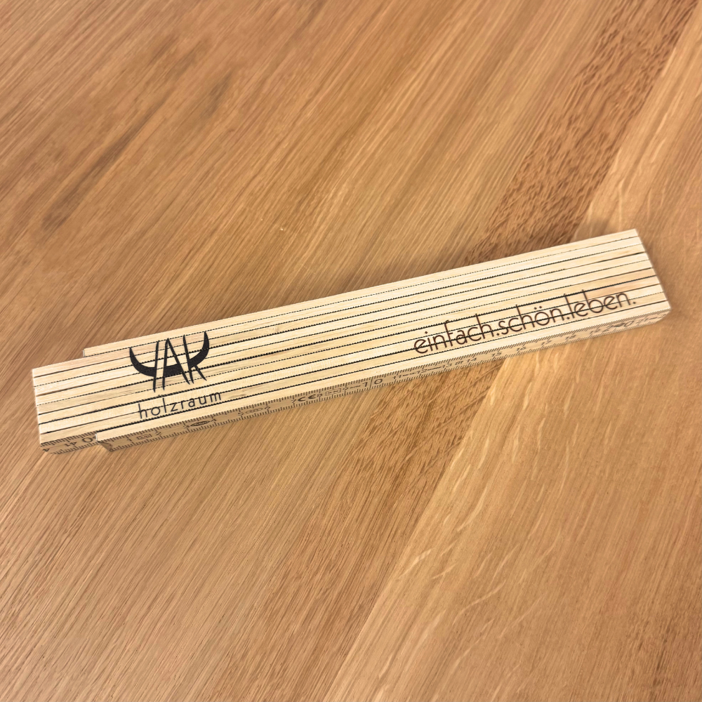 Meterstab_auf_Holz.png
